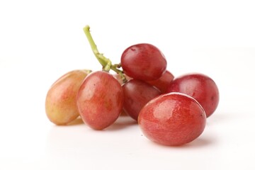 Fototapeta premium Bunch of fresh ripe grapes on white background