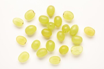 Fototapeta premium Fresh ripe grapes on white background, flat lay