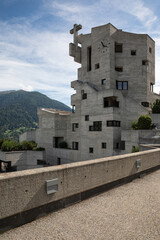 Saint Nicholas Church in Hérémence, Valais, Switzerland, designed by Swiss architect Walter Förderer. The striking Brutalist landmark, completed in 1971, features sculptural raw concrete forms, a cros © STRANOS