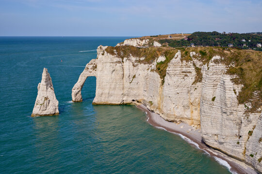 Etretat sea arch and needle cliffs above the English Channel