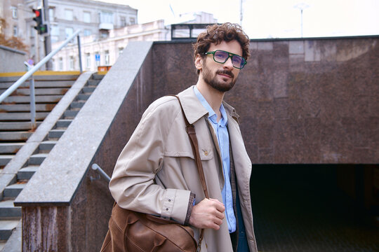 Stylish young businessman showcasing modern elegance in an urban setting