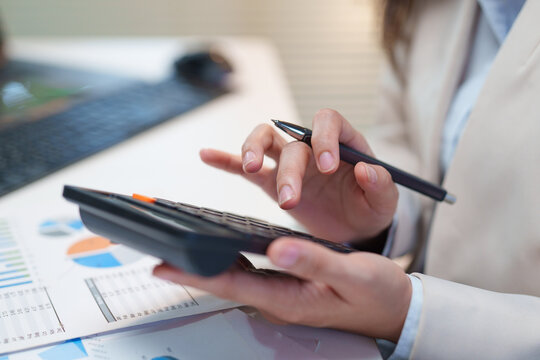 Businesswoman Analyzing Financial Budget Charts