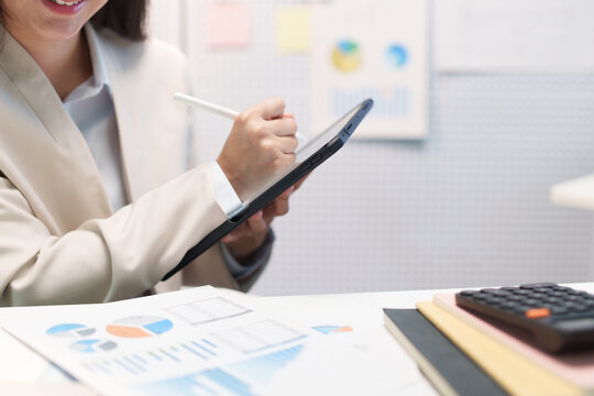 Happy Businesswoman Celebrating Success with Business Analytics