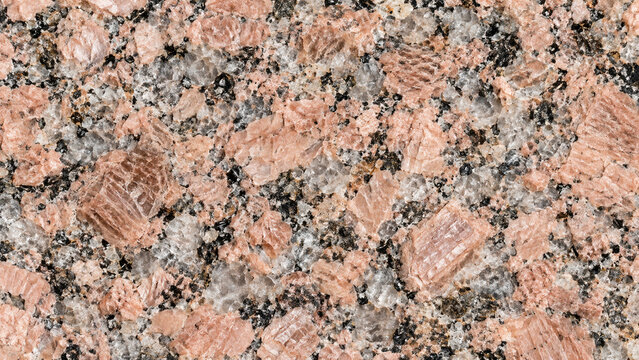 Coarse pink granite texture with large interlocking crystals