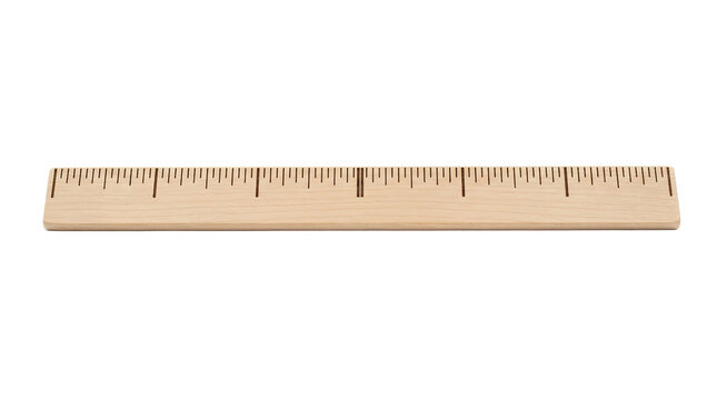 Wooden ruler with centimeter and inch markings on white background