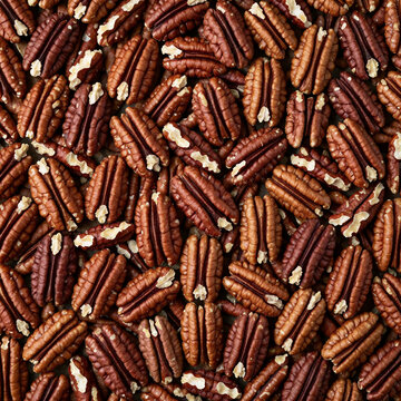 Shelled pecan halves in a pile, top view