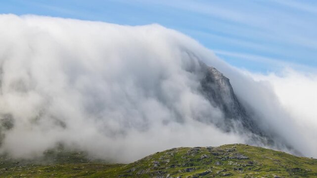 time lapse of the fog flowing over a mountain in Norway