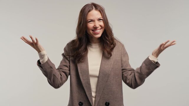 Surprised Adult Woman Making Mind Blown Gesture On White Background. Expresses Wow, incredible news, breakthrough ideas,exciting discoveries