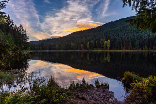 Trillium Lake in Oregon. Calm water reflecting sunset colors