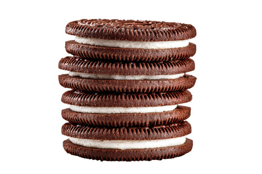 Stack of chocolate sandwich cookies with cream filling isolated on transparent background. A stack of classic chocolate cookies with cream filling isolated on white background.