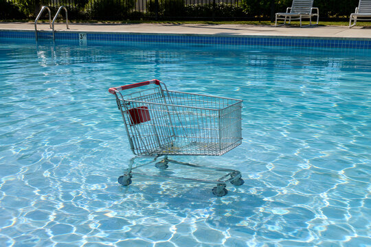 Shopping Cart Abandoned In Middle Of Swimming Pool