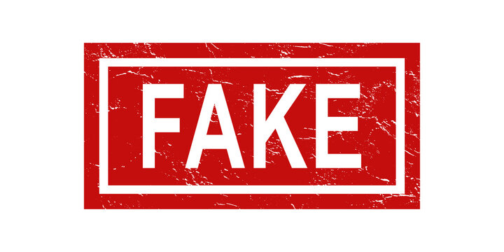 Red rectangular rubber stamp with the word fake in white letters and a distressed grunge texture