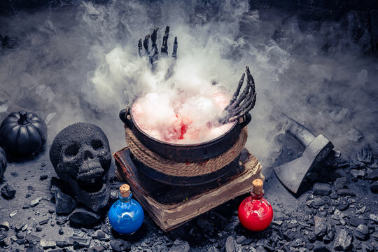 A rustic axe rests near steaming pot.