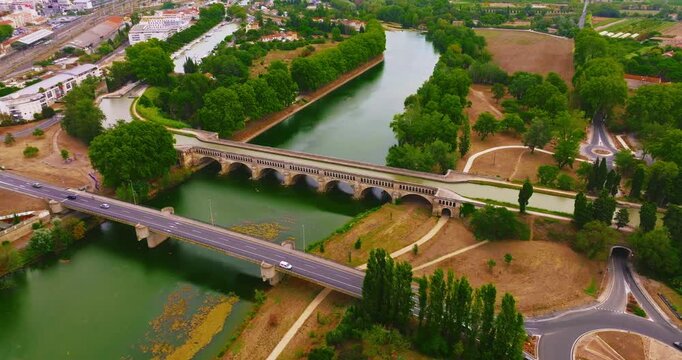 Aerial view of Beziers, charming historic city in southern France, known for the Cathedral of Saint Nazaire, the Canal du Midi, picturesque streets, traditional French architecture