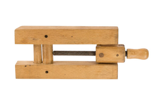 Old wooden hand screw clamp with a metal threaded rod and handle, isolated on a clean white background