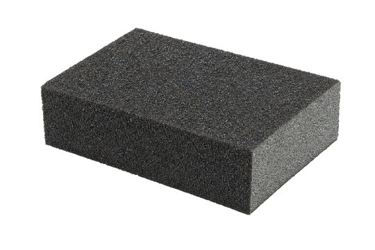 Single rectangular black abrasive sanding sponge with a coarse textured surface, isolated on a clean white background