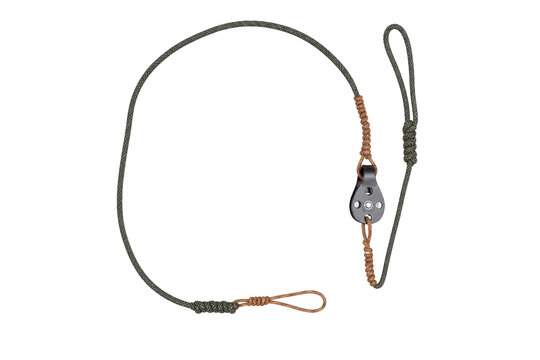 Durable camouflage paracord rope with a black pulley block and orange accents is neatly arranged on a clean white background