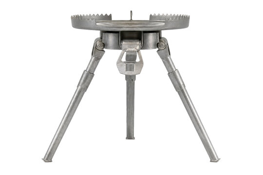 Vintage silver metal portable camping stove stand with three legs is isolated on a clean white background