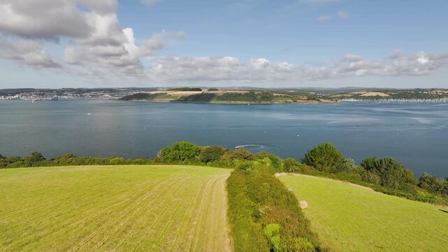 Farms and Fields over St Mawes from drone, Carrick Roads, River Fal, Falmouth, Cornwall, UK