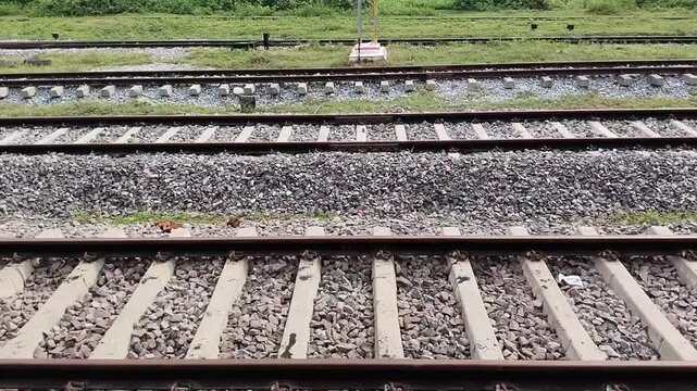 High Angle View of Multiple Parallel Railway Tracks with Stone Ballast and Sleepers
