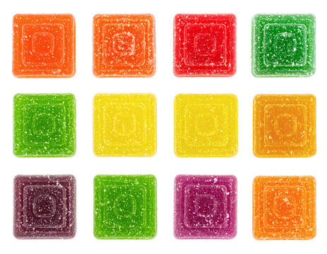 Gummy candies of various bright colors and square shapes arranged in a neat grid pattern showing delicious fruit flavored gelatin sugar coated&nbsp;