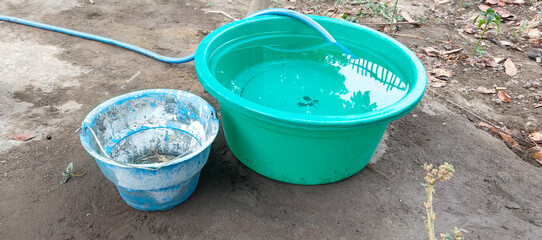 two buckets of water © Dwi