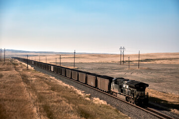 Coal Train Crossing Open Plains © jia