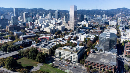 Fototapeta premium aerial shot of downtown Portland, Oregon showing the historic White Stag sign, taken in late 2026.