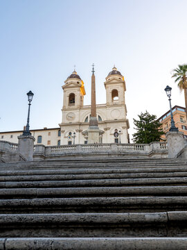 View of the Trinita dei Monti church and the Sallustiano Obelisk at the top of the Spanish Steps in Rome, Lazio, Italy.