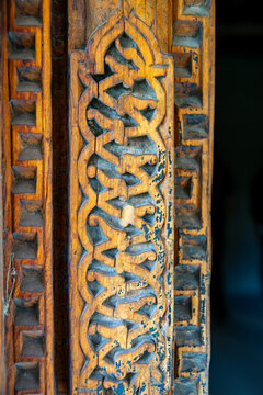 View of intricate traditional wooden carvings on a door frame at Khaplu Fort, Khaplu, Gilgit, Pakistan.
