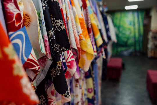 A rack of colorful yukatas on display in a rental shop in Asakusa ,Tokyo, Japan. Customers select these traditional summer kimonos for sightseeing.