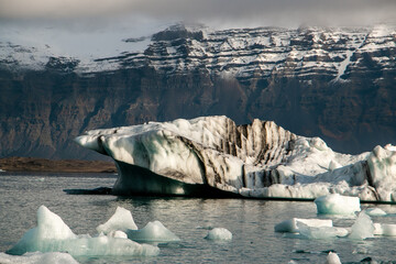 Large Textured Iceberg Floating in Jokulsarlon Glacier Lagoon © Jennifer