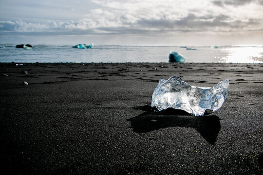 Glacial Ice Block on Black Sand at Diamond Beach Iceland