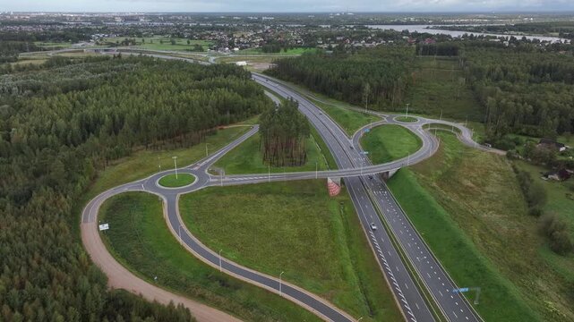 Aerial View of A7 Highway Interchange with Overpass and Roundabouts in Kekava, Latvia