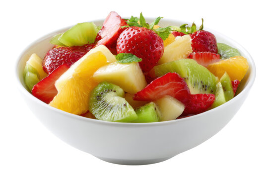 Fresh mixed fruit salad bowl with strawberries kiwi mango and mint leaves