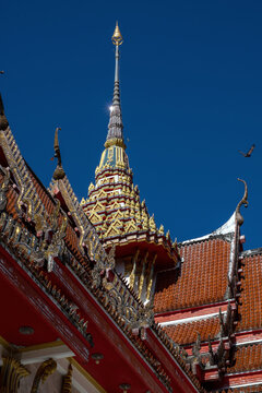 Chofa Roof Finials and Naga Ornament at Wat Chalong