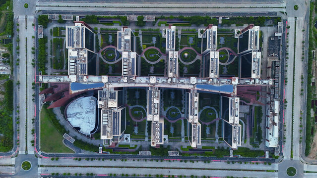 Surat, India - 28 September 2026: Aerial view of the Surat Diamond Bourse, featuring massive interconnected office blocks, landscaped courtyards, and modern architecture in Surat, Gujarat, India.