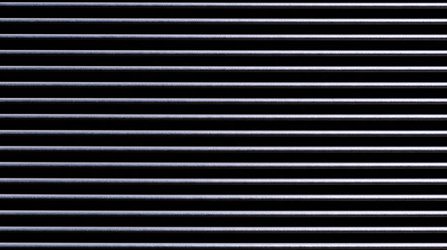 Modern horizontal metal grill shutter door texture with dark background lines