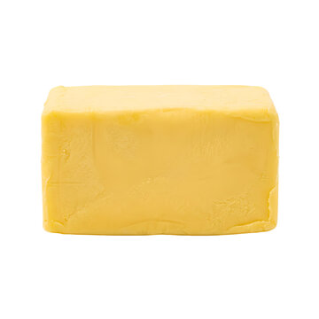 Rectangular block of yellow dairy butter on transparent background