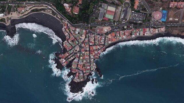 Aerial view of the dense urban layout and coastal architecture of Santa Cruz de Tenerife, Canary Islands, Spain.