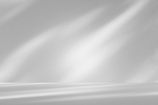 Wall interior background, studio and backdrops show products.with shadow from window color white and grey. background for text insertion and presentation product	
