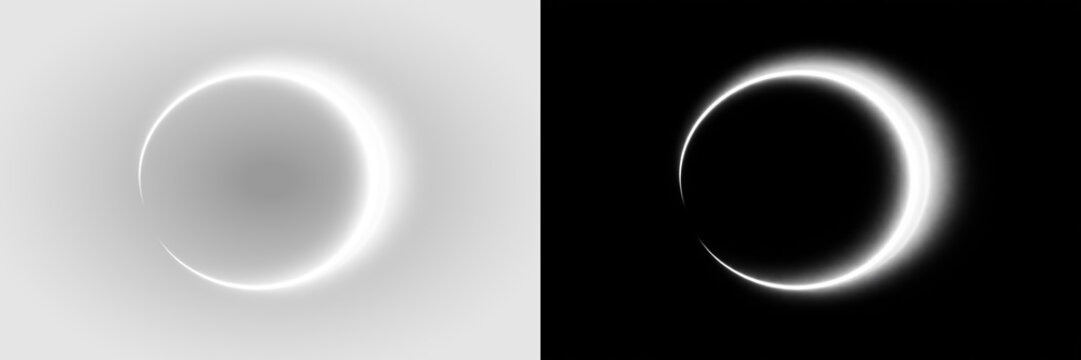 Pair of white glowing circular rings with soft halos on transparent background