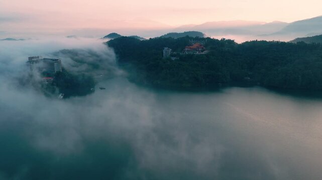Aerial drone footage over the sun moon lake at morning in Taiwan
