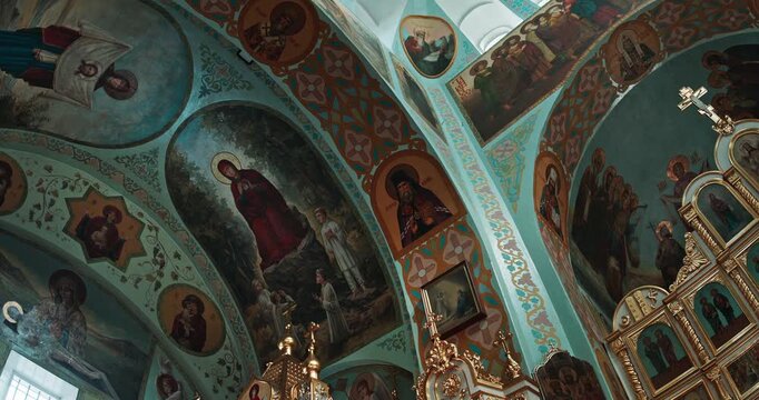 Orthodox Church Interior with Frescoes, Saints and Gilded Iconostasis