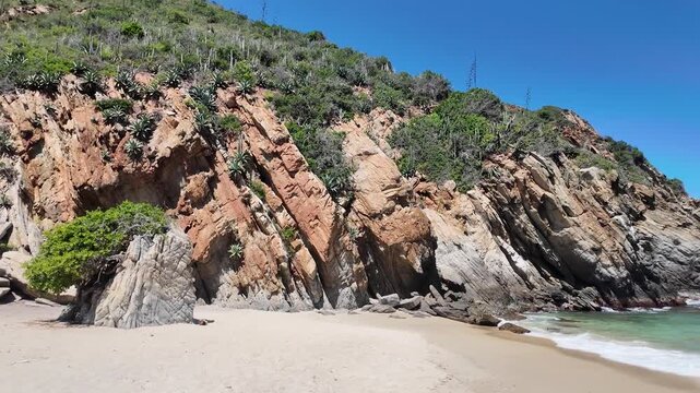 View over rocky cliffs and a cove on the Venezuelan coast