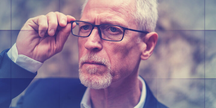 Portrait of handsome mature man, light effect, geometric pattern