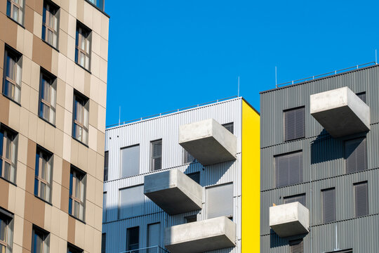 Colorful modern apartment facades with geometric balconies at Aspern Seestadt Vienna Austria showing contemporary residential housing design