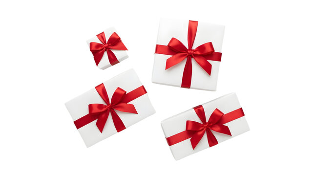Group of white gift boxes with red ribbons and bows isolated on transparent background