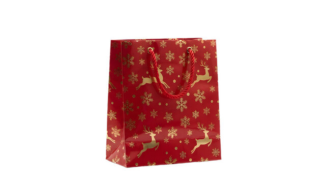 Red christmas gift bag with gold reindeer and snowflake pattern isolated on transparent background