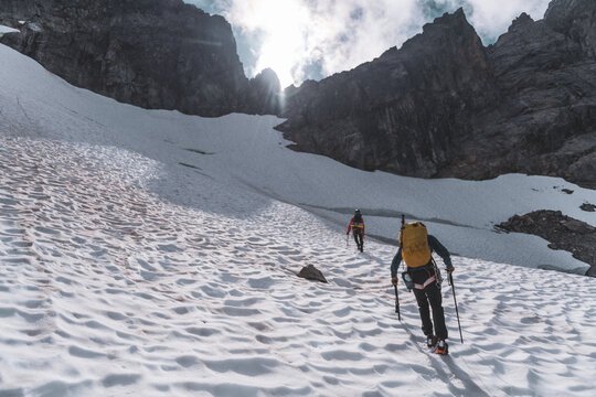 Two Mountaineers Climbing Snow Slope in Tantalus Range, Squamish